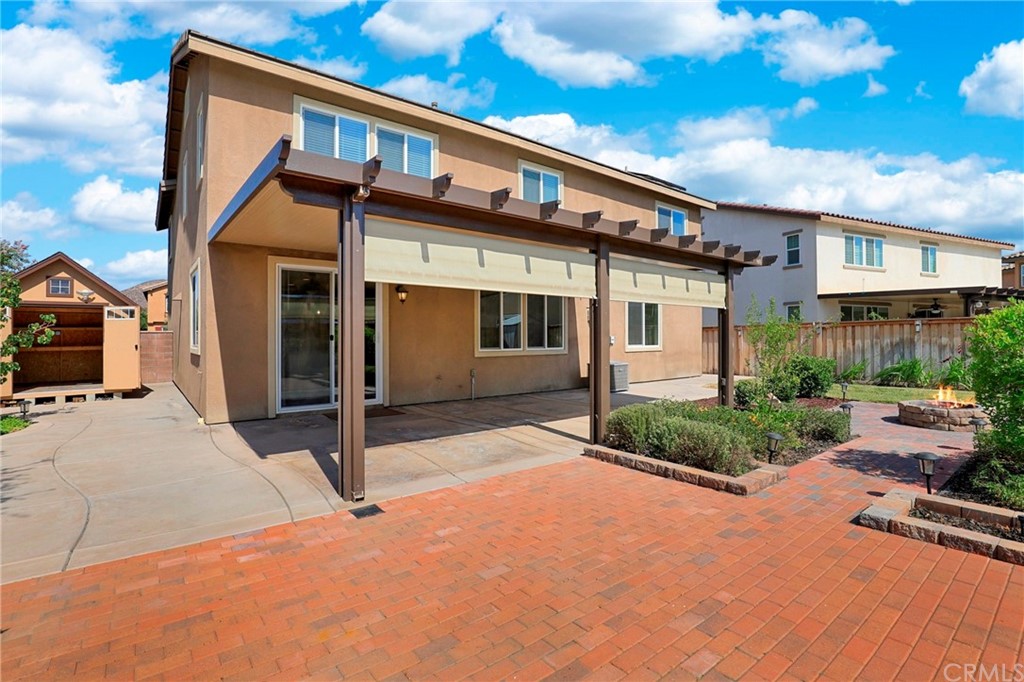29309 First Green Lake Elsinore, CA 92530 - Photo 45 of 59 a front view of a house with garden