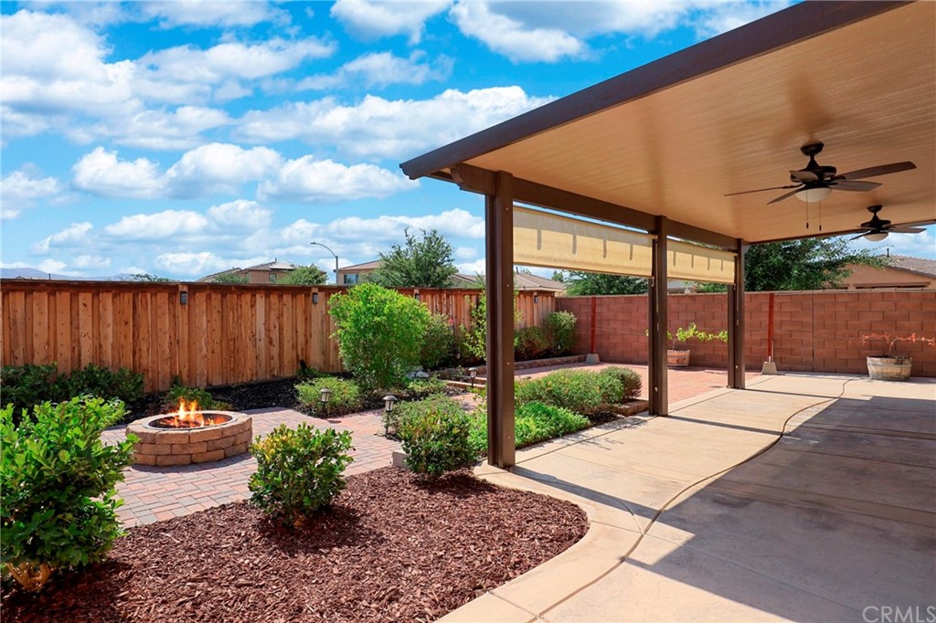 29309 First Green Lake Elsinore, CA 92530 - Photo 49 of 59 a backyard of a house with lots of green space