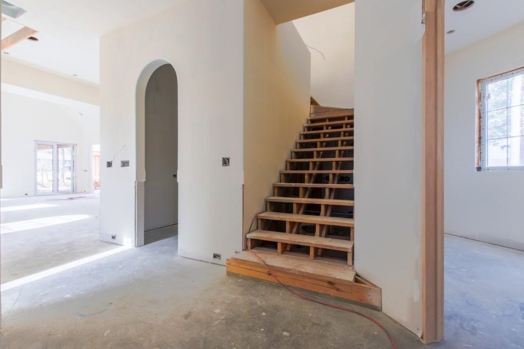 4317 Sugar Pike Road Canton, GA 30115 - Photo 12 of 42 a view of an empty room with wooden floor and windows