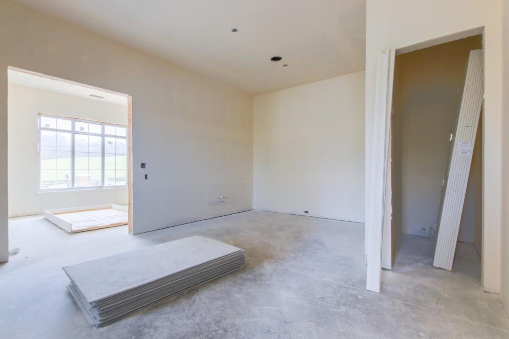 4317 Sugar Pike Road Canton, GA 30115 - Photo 17 of 42 an empty room with windows