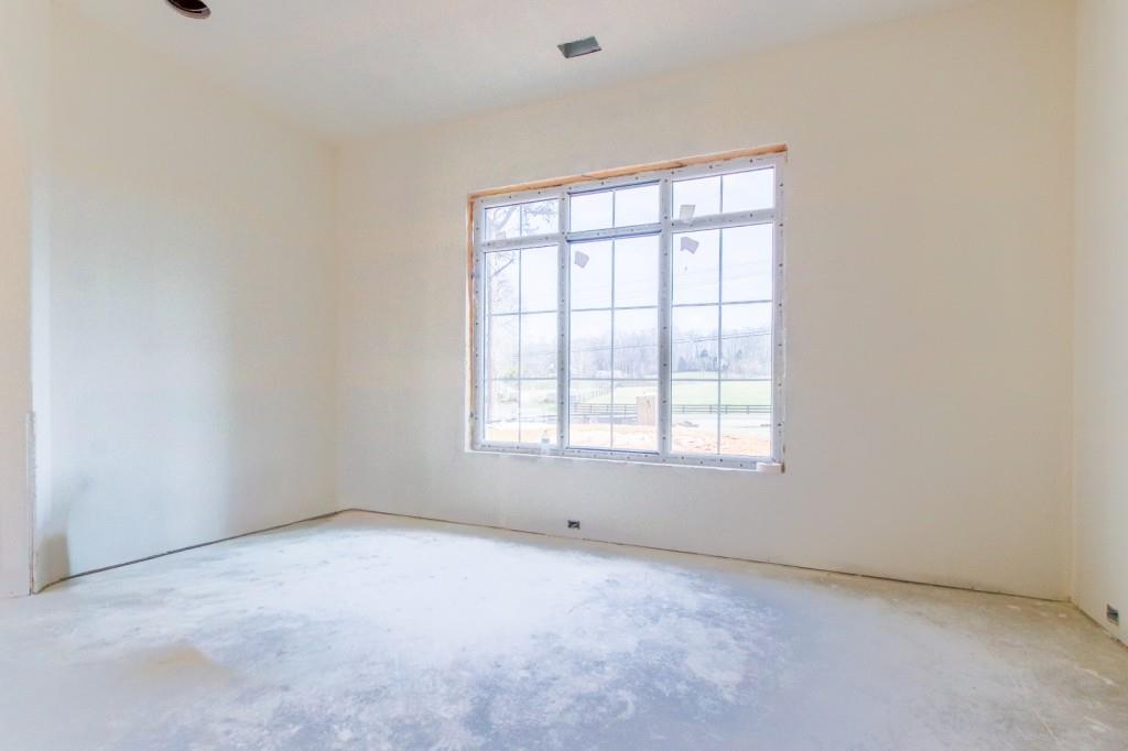 4317 Sugar Pike Road Canton, GA 30115 - Photo 20 of 42 an empty room with a window