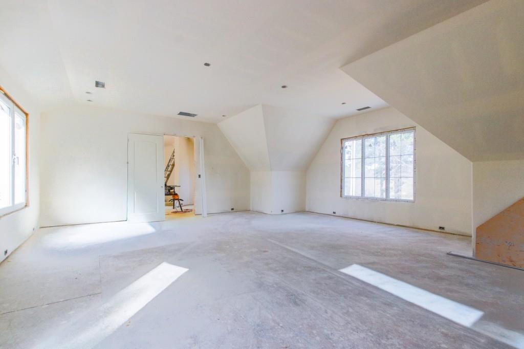 4317 Sugar Pike Road Canton, GA 30115 - Photo 32 of 42 an empty room with windows and closet