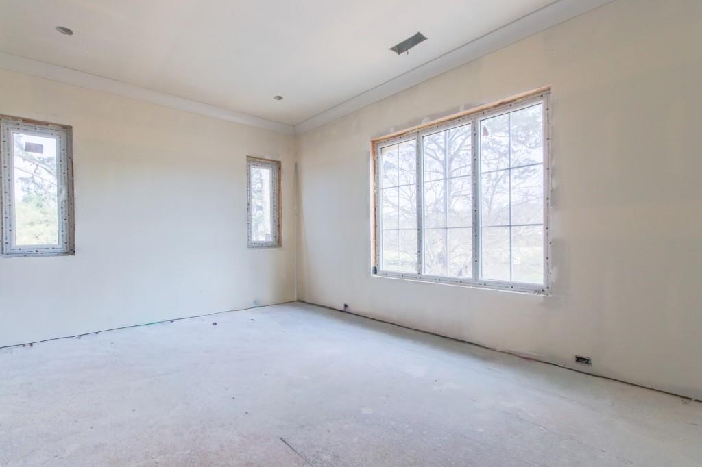 4317 Sugar Pike Road Canton, GA 30115 - Photo 35 of 42 an empty room with windows