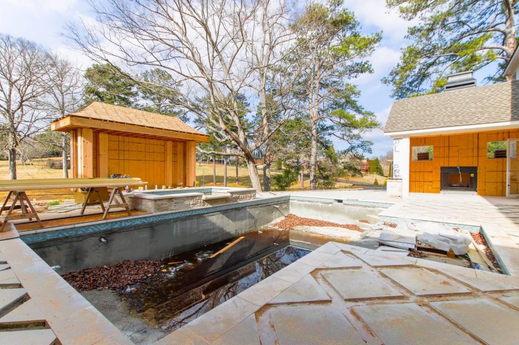 4317 Sugar Pike Road Canton, GA 30115 - Photo 40 of 42 a view of a house with a patio