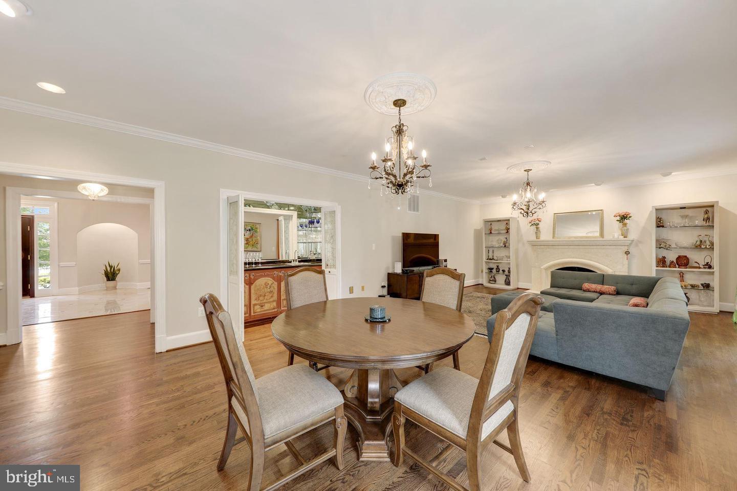 9809 Hall Road Potomac, MD 20854 - Photo 22 of 60 a view of a dining room with furniture and wooden floor