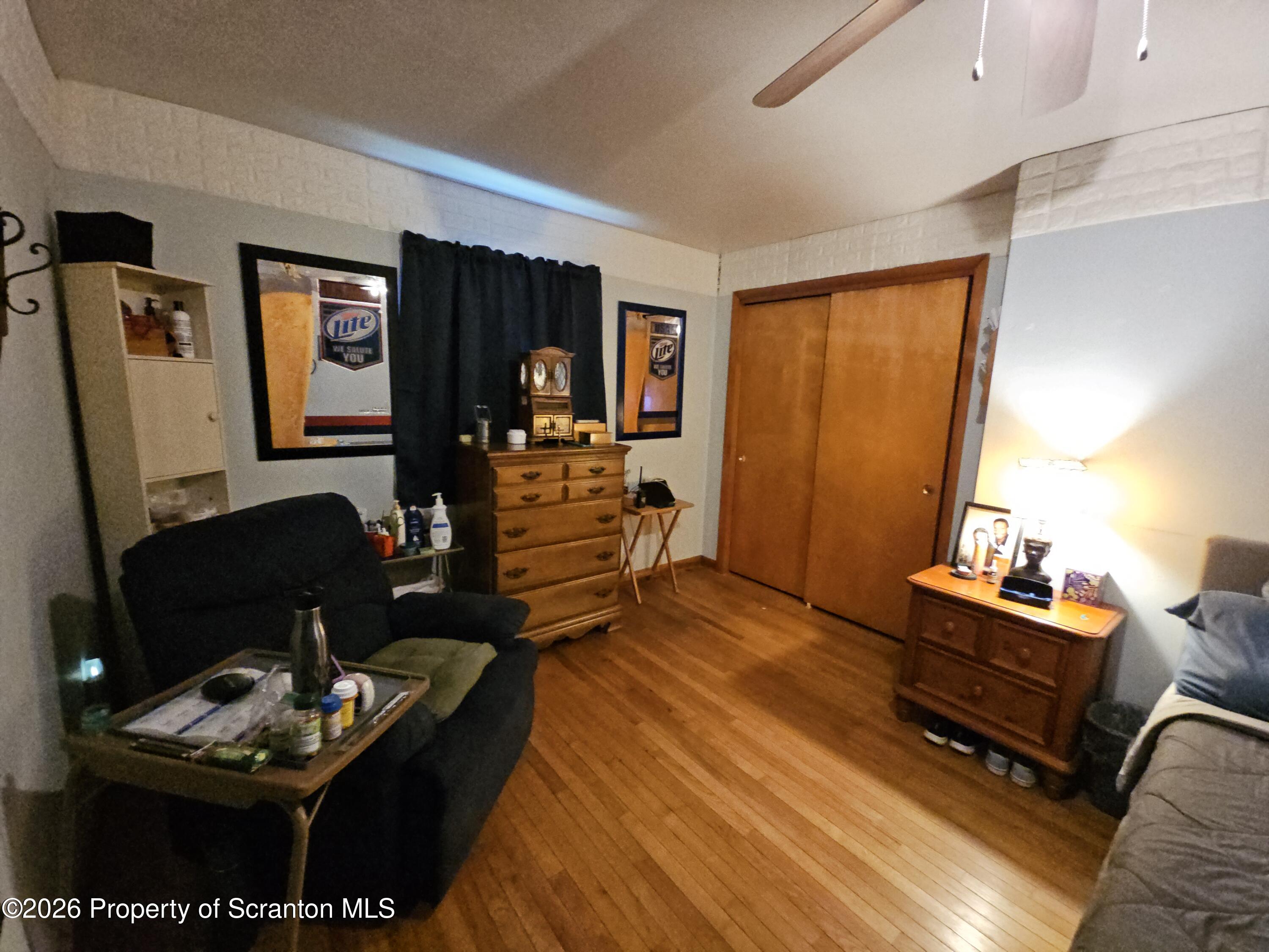405 Baker Street Taylor, PA 18517 - Photo 26 of 36 a living room with furniture and a window