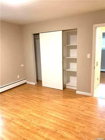 a view of an empty room and window