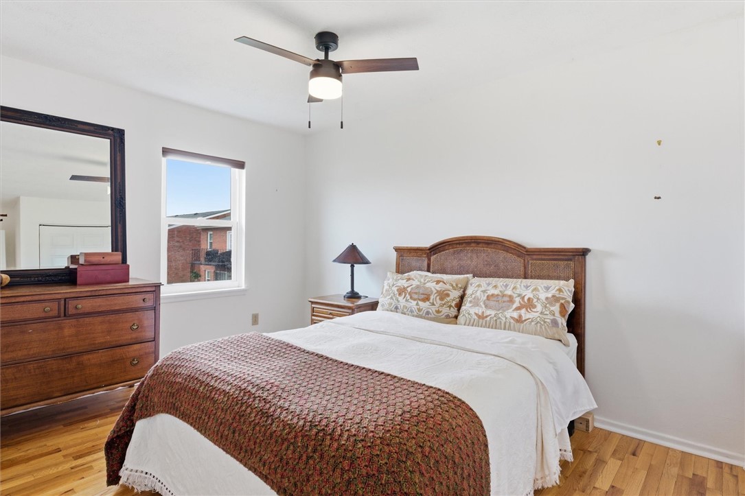 500 Concord Road Anderson, SC 29621 - Photo 21 of 23 This cozy bedroom features warm wood flooring and a refreshing ceiling fan for comfort.