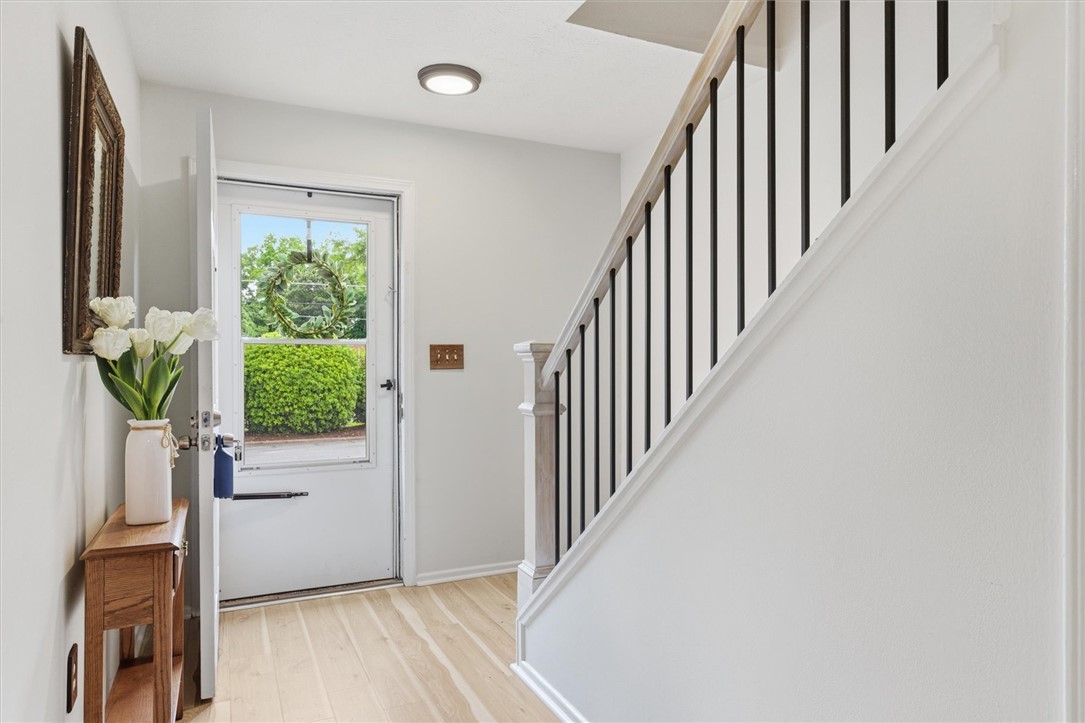 500 Concord Road Anderson, SC 29621 - Photo 3 of 23 Step into this bright foyer featuring a staircase and inviting entryway.