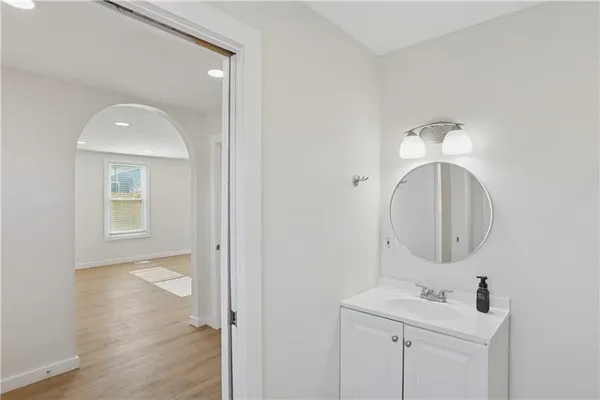 a bathroom with a sink and a mirror