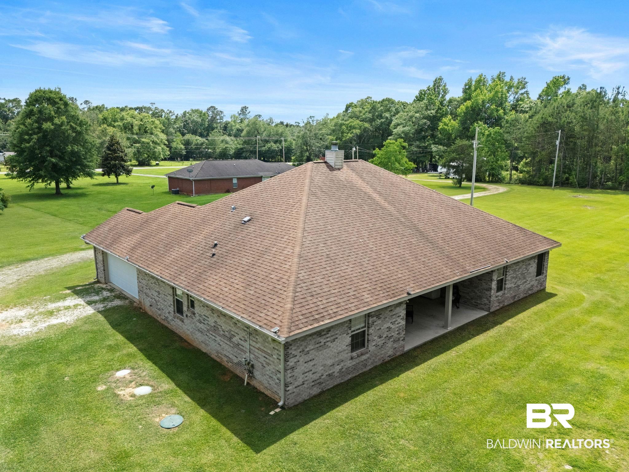 16151 Tolbert Road Bay Minette, AL 36507 - Photo 57 of 74 Single-story brick residence with an attached garage, a covered patio