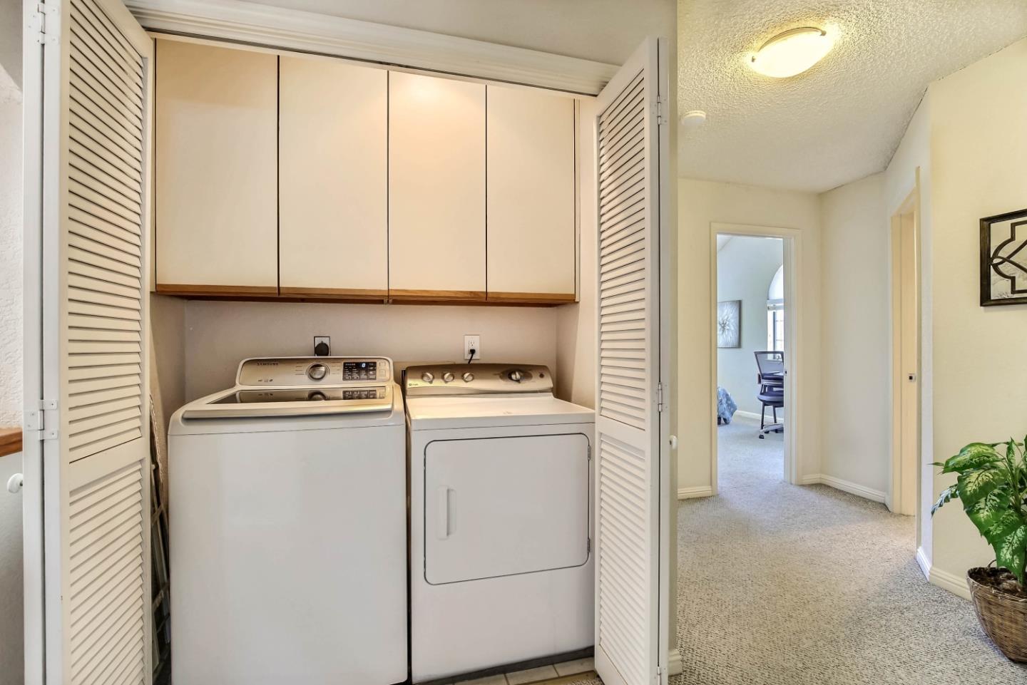 104 Redding Road Campbell, CA 95008 - Photo 15 of 23 a view of washer and dryer with bathroom in the background