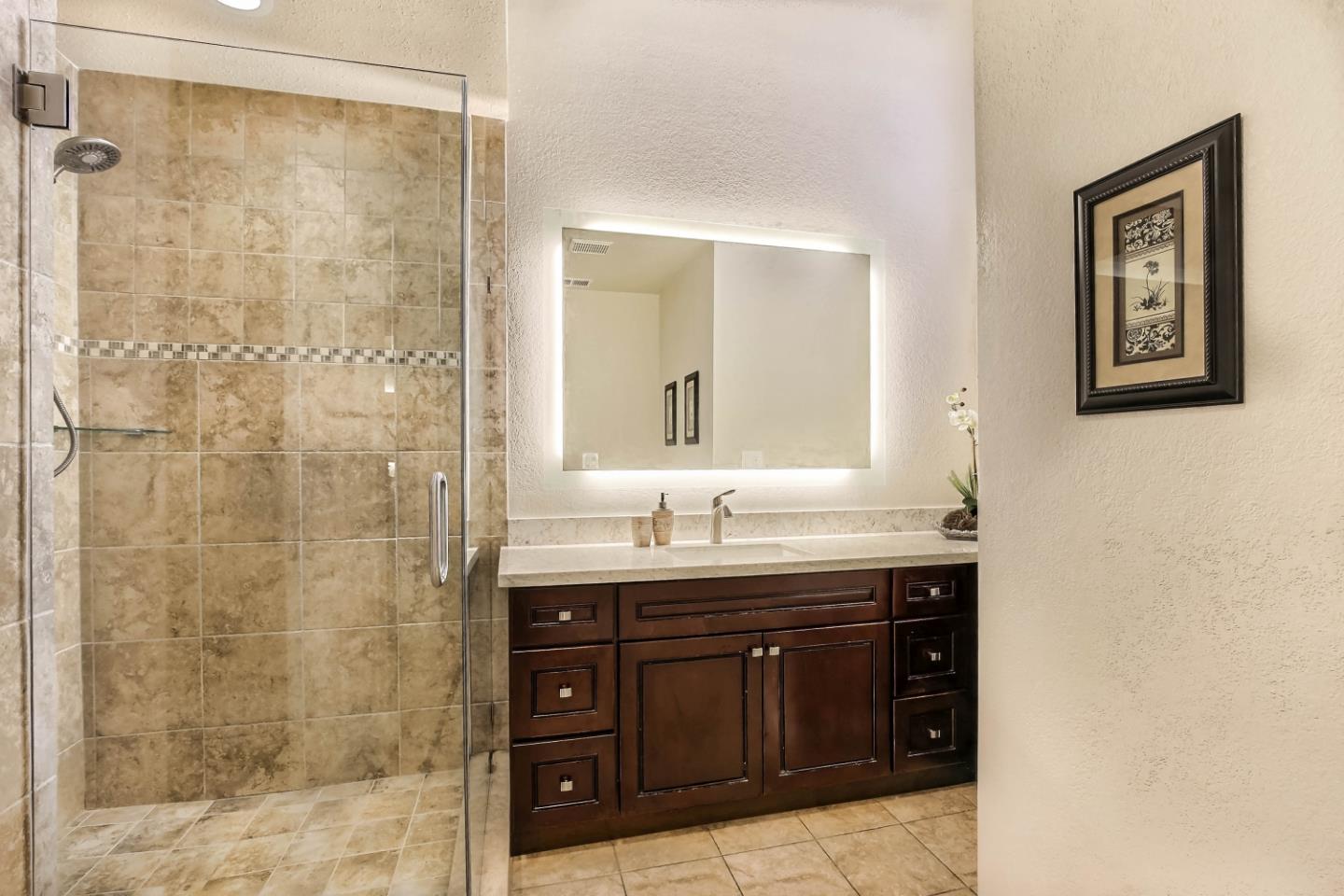 104 Redding Road Campbell, CA 95008 - Photo 18 of 23 a bathroom with a granite countertop sink mirror and a shower
