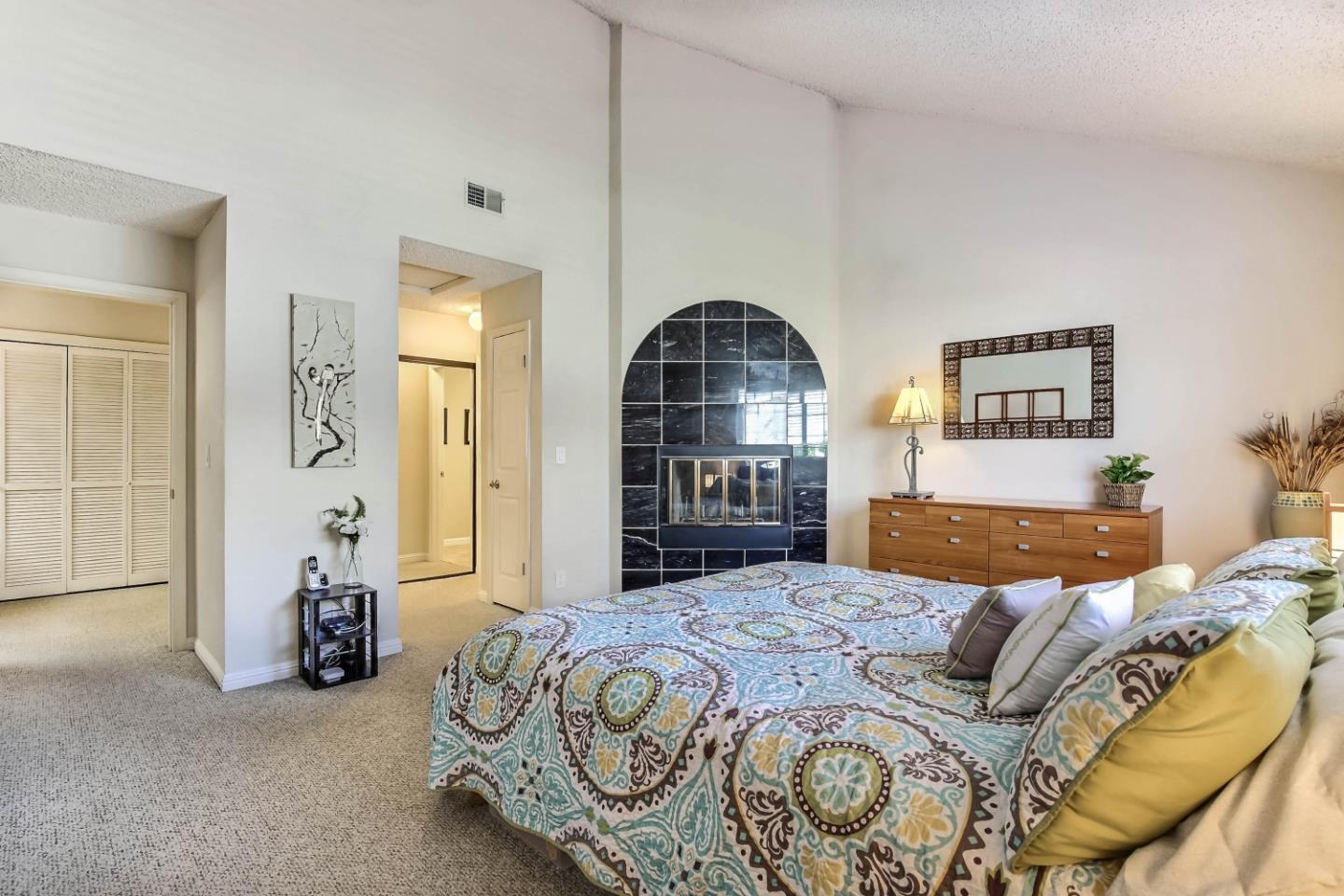 104 Redding Road Campbell, CA 95008 - Photo 10 of 23 a bedroom with a bed and a mirror