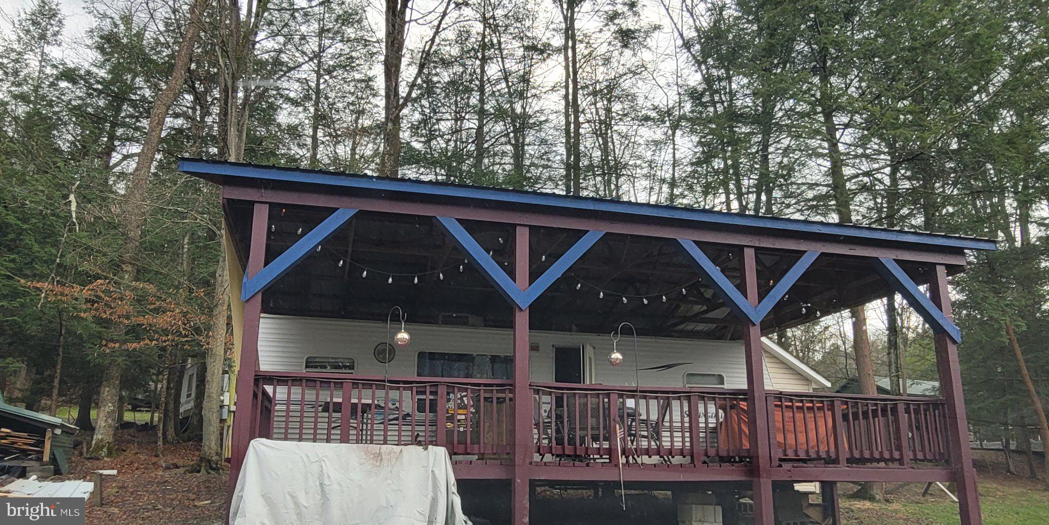 175 Horseshoe Crescent Drive Flinton, PA 16640 - Photo 1 of 11 Charming cabin nestled in the woods.