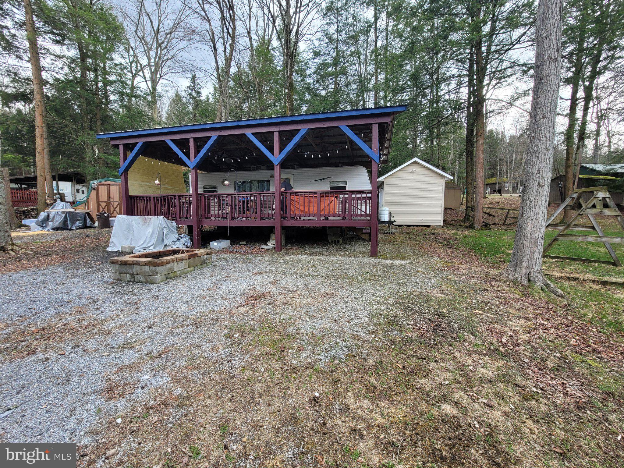 175 Horseshoe Crescent Drive Flinton, PA 16640 - Photo 2 of 11 Charming retreat in a wooded setting.