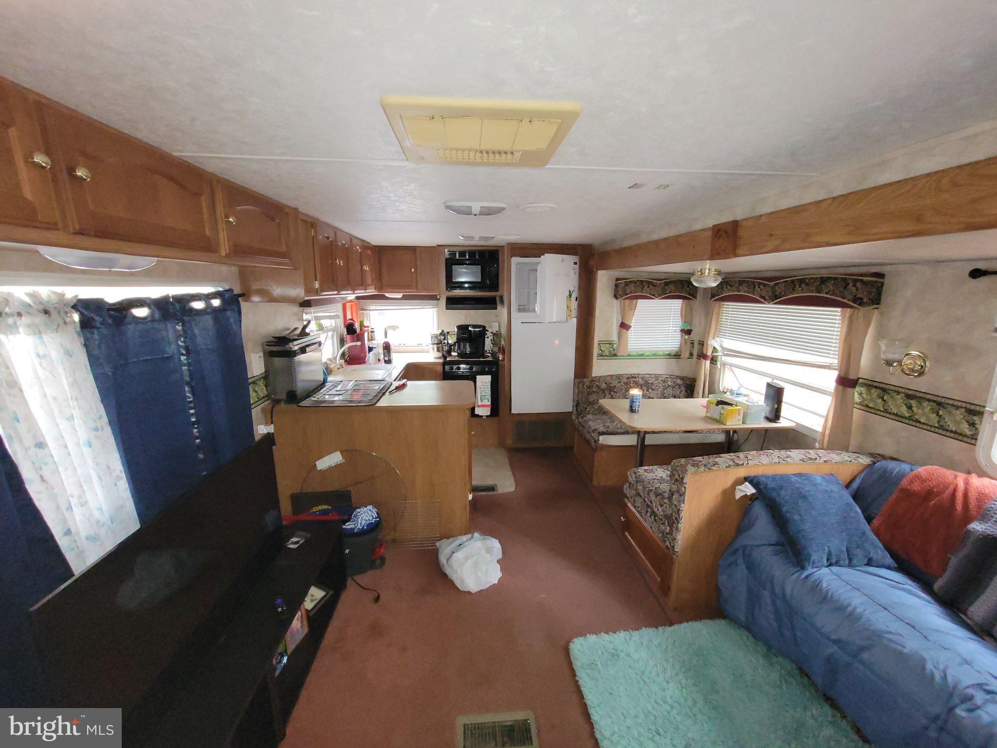 175 Horseshoe Crescent Drive Flinton, PA 16640 - Photo 7 of 11 Cozy mobile retreat with modern comforts.