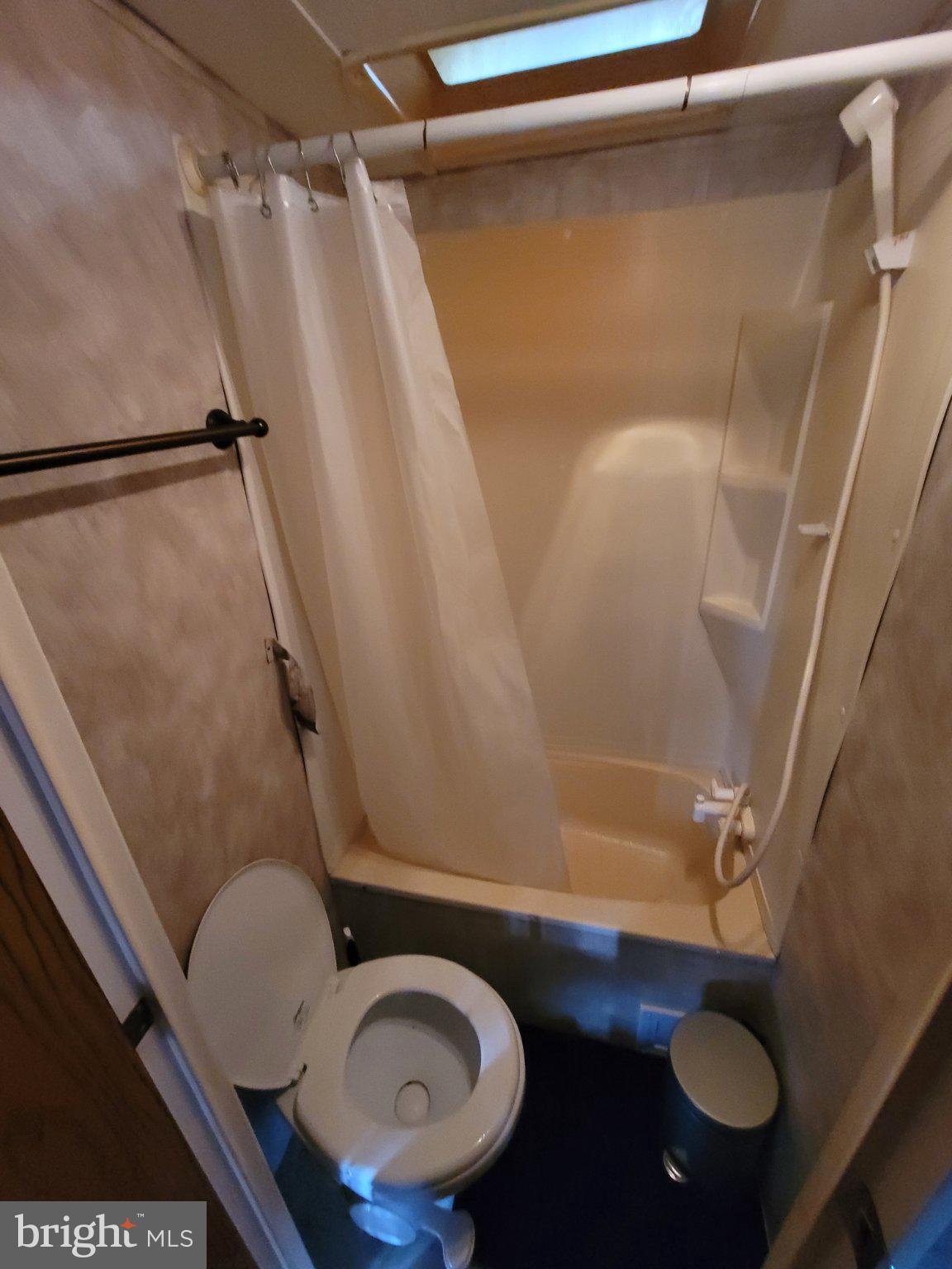 175 Horseshoe Crescent Drive Flinton, PA 16640 - Photo 9 of 11 Compact bathroom with shower and toilet.