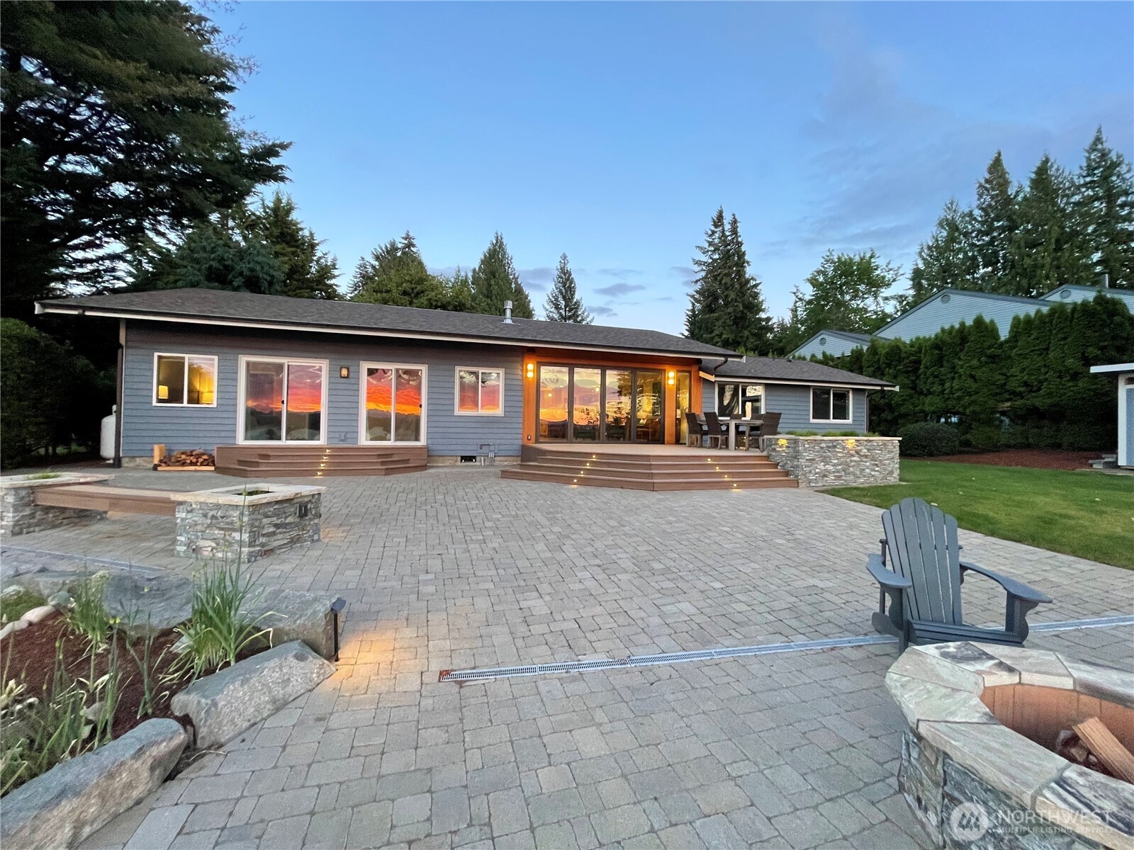 7713 78th Loop Northwest Olympia, WA 98502 - Photo 35 of 40 a front view of a house with garden