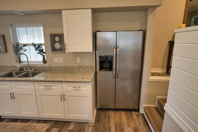 a vase of flowers sitting on a table
