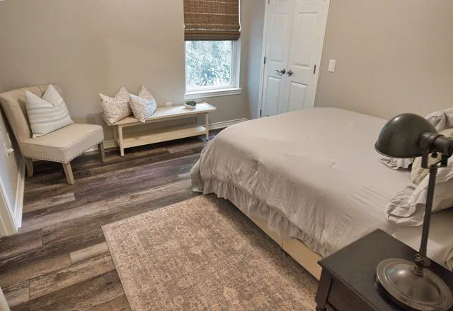 a bathroom with a glass door shower
