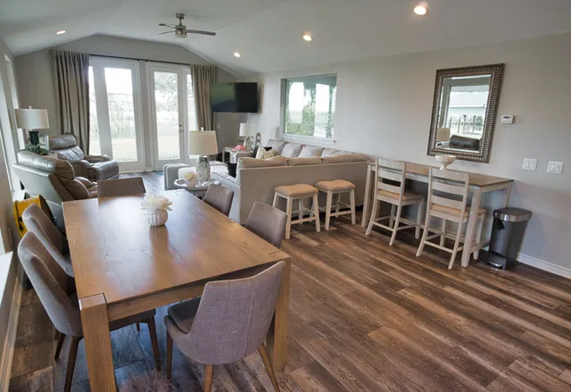 a view of a dining room with furniture window and wooden floor