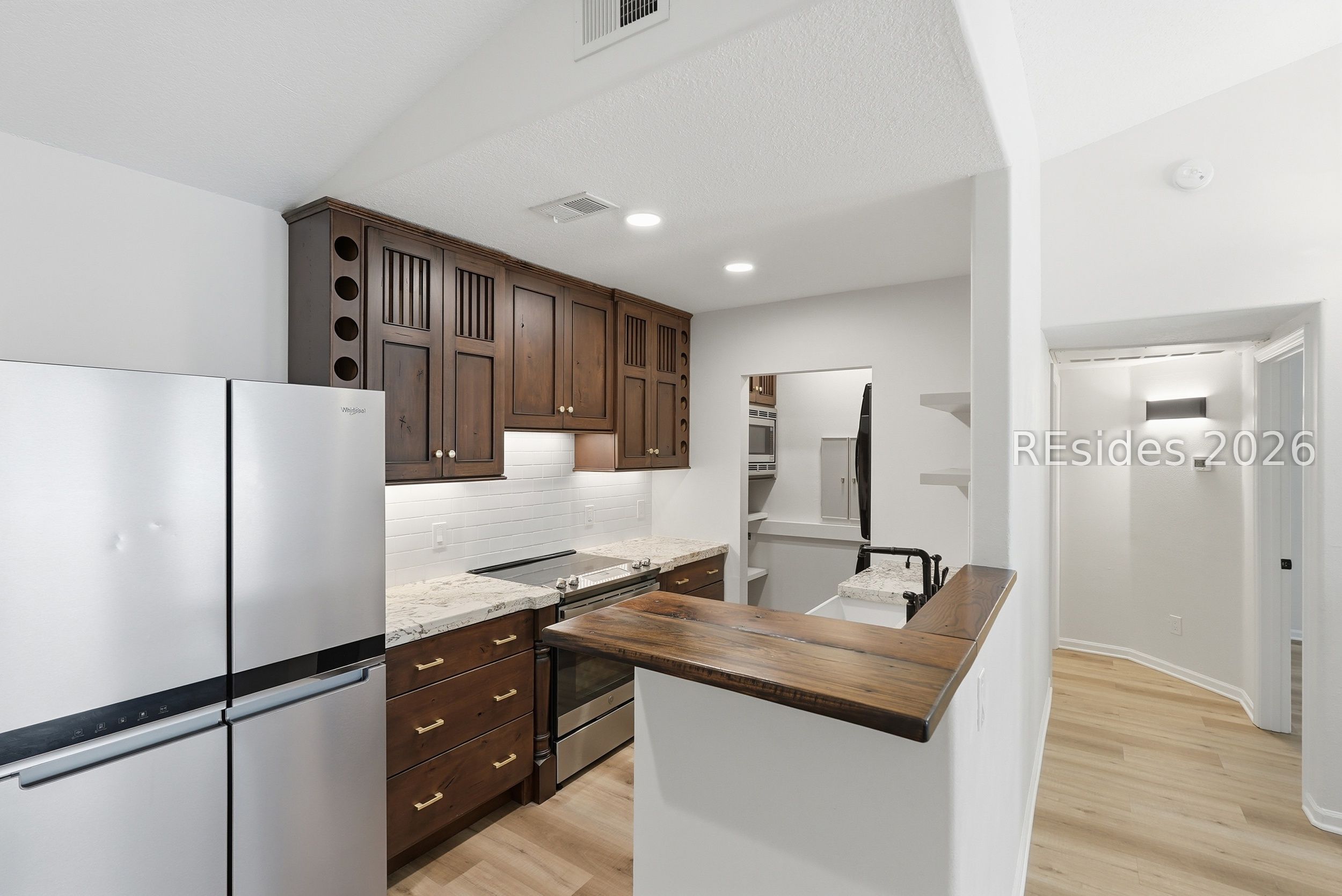 897 Fording Island Road, Unit 1303 Bluffton, SC 29910 - Photo 9 of 48 Completely re-designed kitchen w/ custom cabinetry