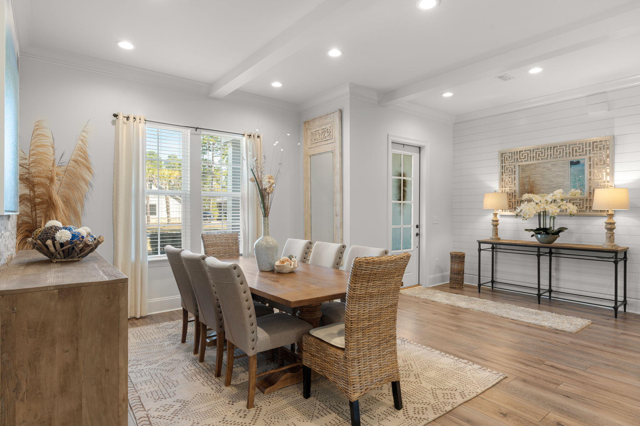 78 Grizzly Street Freeport, FL 32439 - Photo 20 of 65 a view of a dining room with furniture window and wooden floor