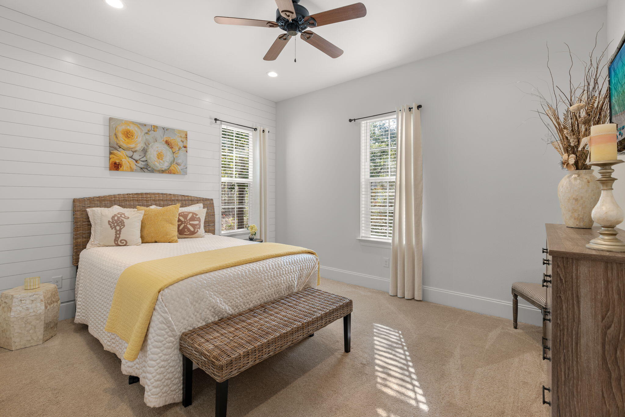 78 Grizzly Street Freeport, FL 32439 - Photo 26 of 65 a bedroom with a bed and a chandelier