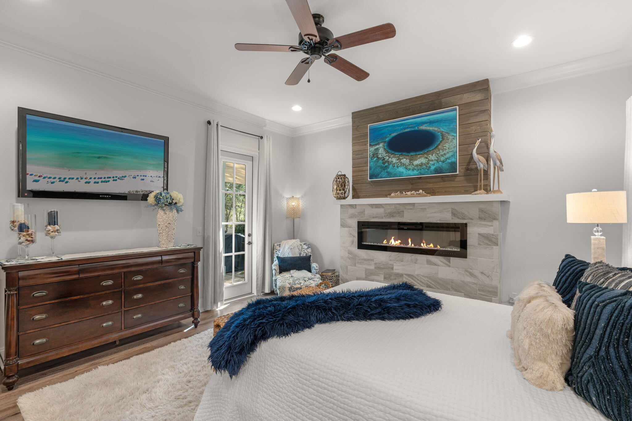 78 Grizzly Street Freeport, FL 32439 - Photo 29 of 65 a bedroom with a bed and a flat screen tv