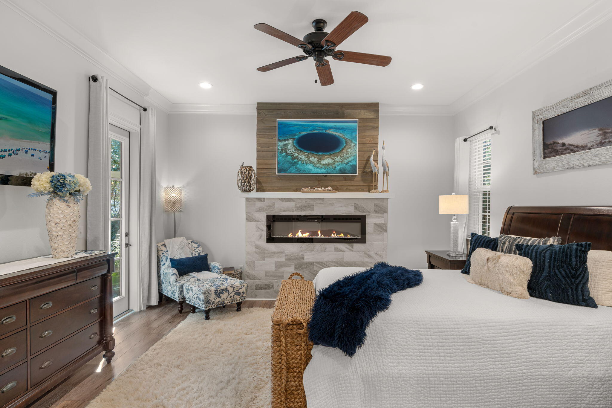 78 Grizzly Street Freeport, FL 32439 - Photo 30 of 65 a bedroom with a bed and a fireplace