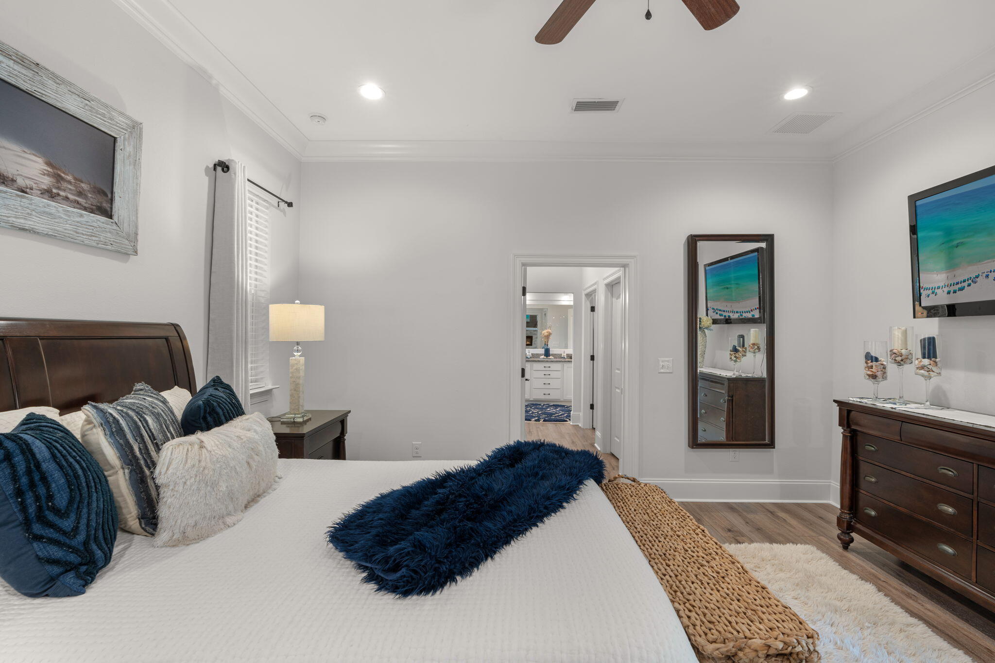 78 Grizzly Street Freeport, FL 32439 - Photo 31 of 65 a bedroom with a bed and a dresser