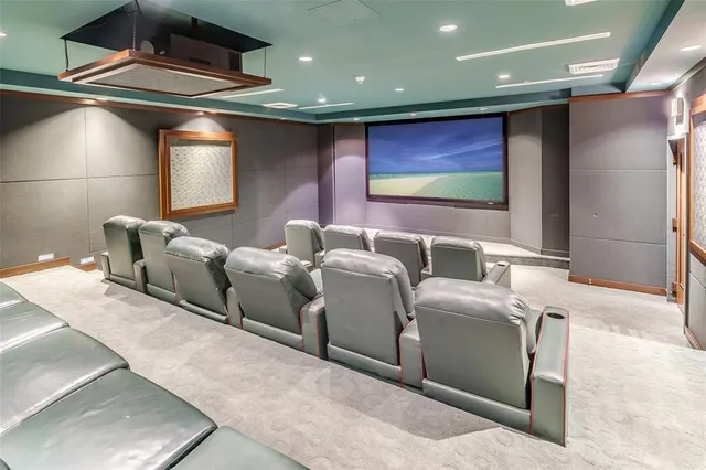 a view of a hallway with paintings on the wall