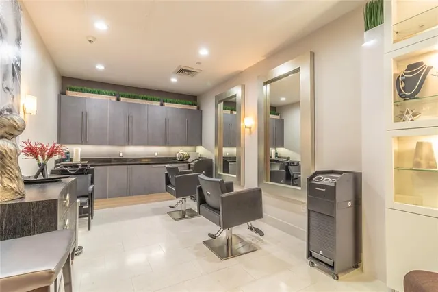 a spacious bedroom with a bed and a window