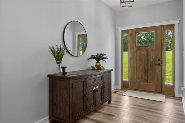 a view of a bathroom from a hallway