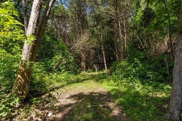 a view of a field with an outdoor space