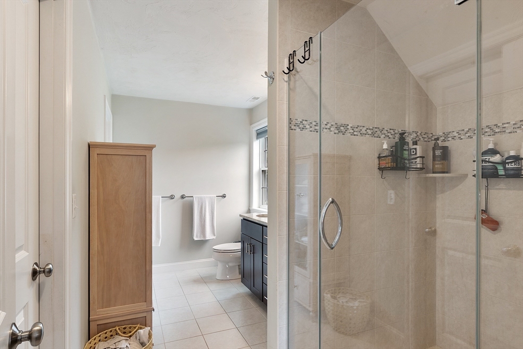 46 Jordan Road Holden, MA 01520 - Photo 21 of 42 a bathroom with a shower and a toilet