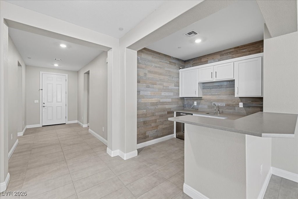 6479 Corsari Ridge Street Las Vegas, NV 89166 - Photo 8 of 38 Wet bar in great room between kitchen and entry hall