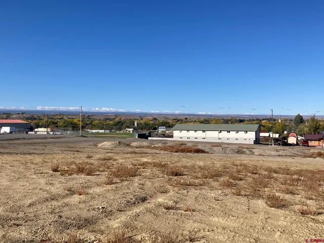 a view of a road with an ocean view