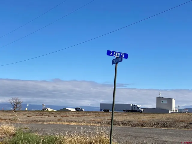 a view of ocean with a road