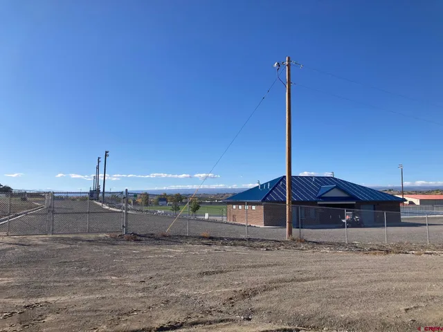a view of a road from a backyard