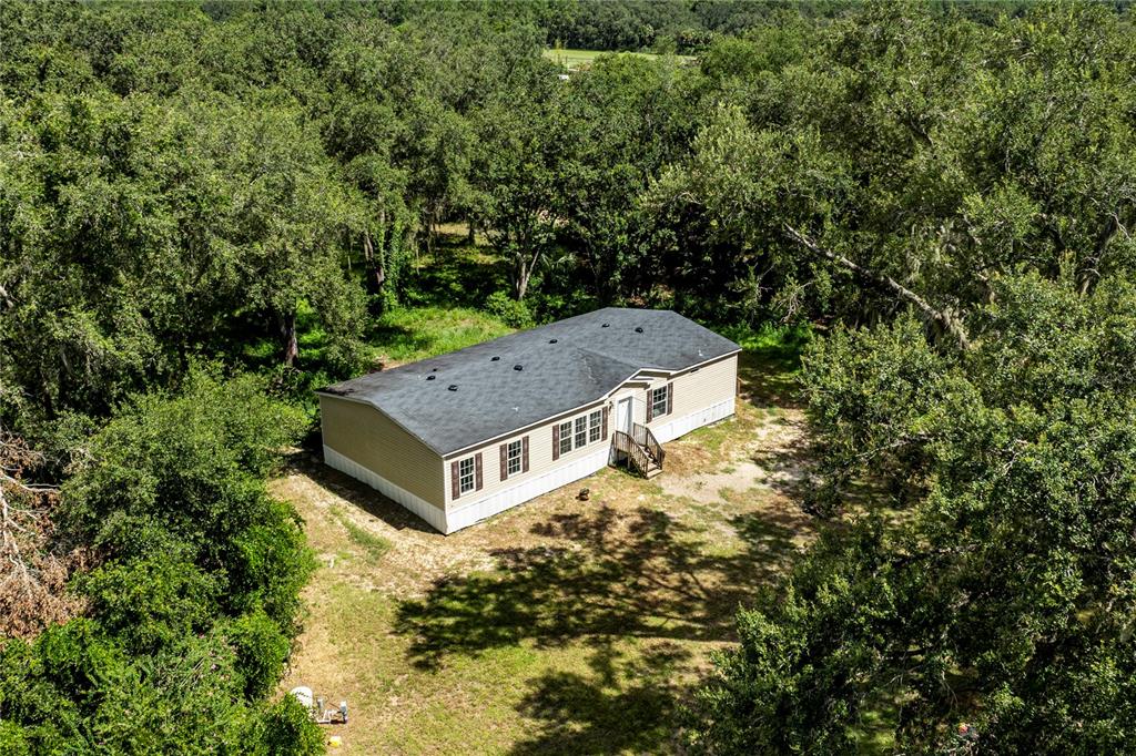 a house with trees in front of it