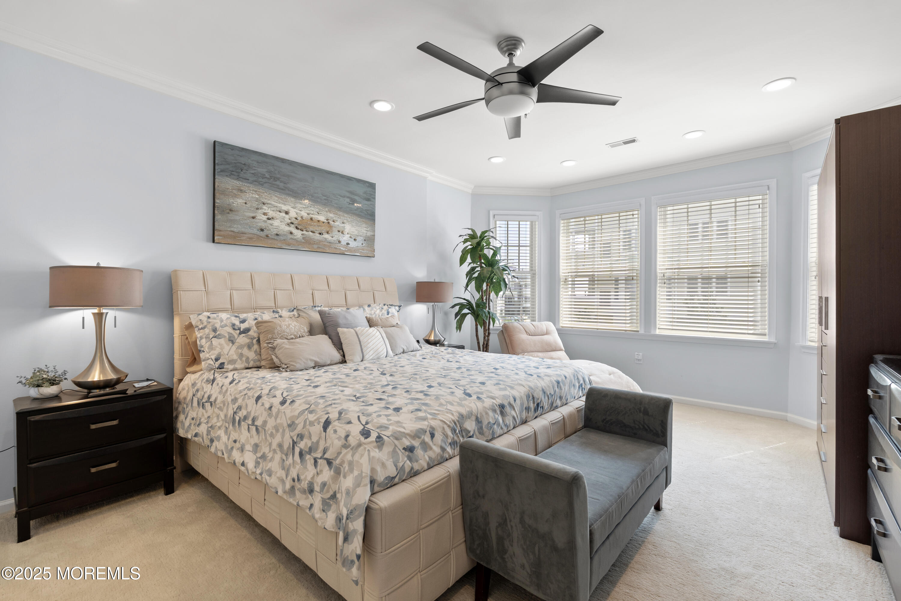 33 Cooper Avenue, Unit 208 Long Branch, NJ 07740 - Photo 14 of 43 a bedroom with a large bed and a window