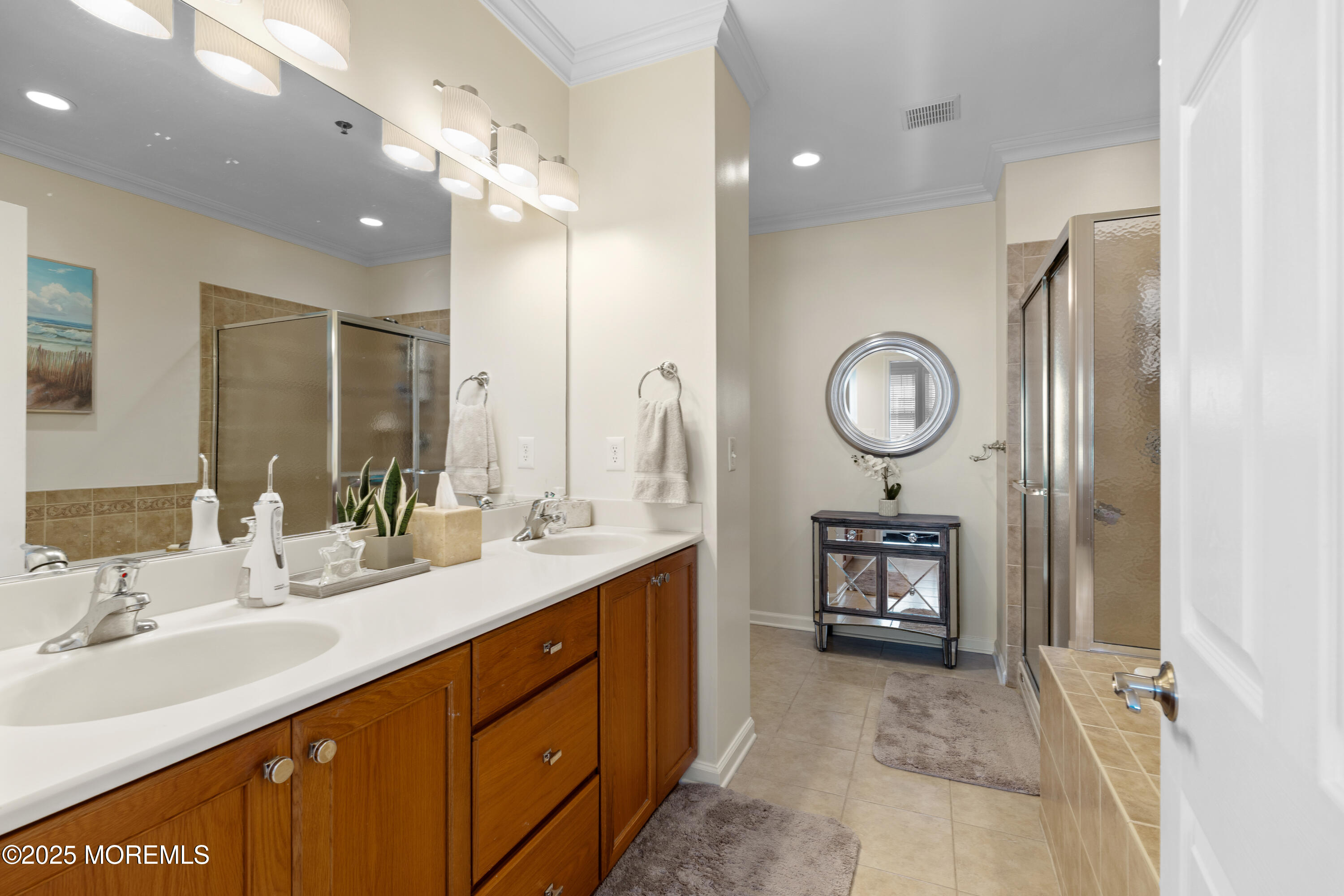 33 Cooper Avenue, Unit 208 Long Branch, NJ 07740 - Photo 16 of 43 a bathroom with a double vanity sink and a mirror