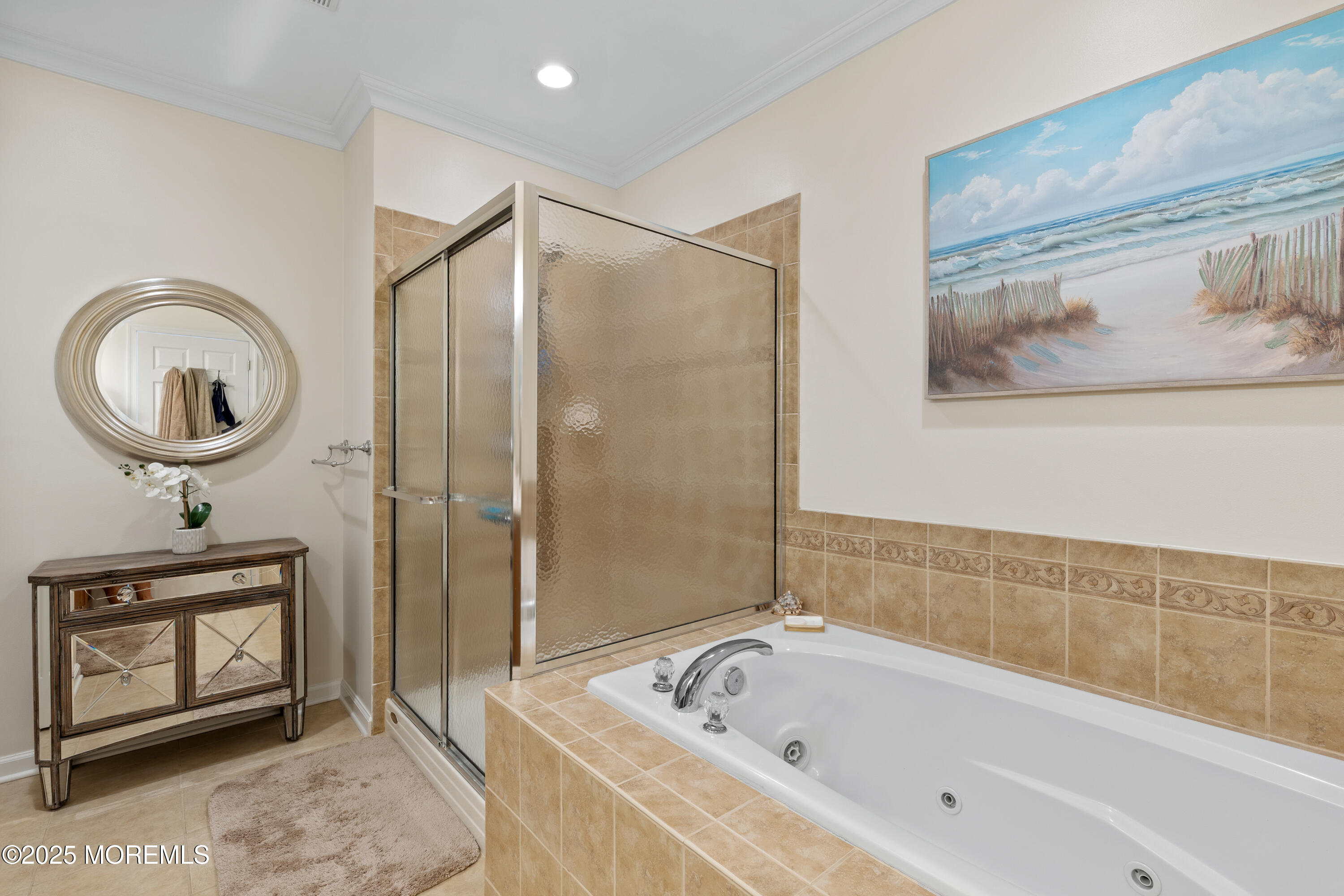 33 Cooper Avenue, Unit 208 Long Branch, NJ 07740 - Photo 17 of 43 a bathroom with a bathtub a mirror and a shower