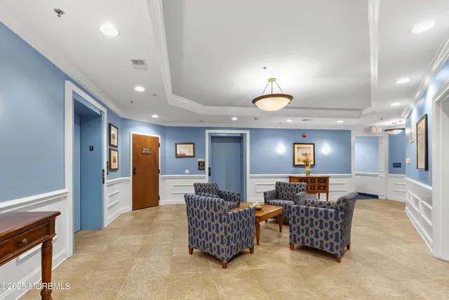 a bathroom with a sink a toilet and a shower curtain