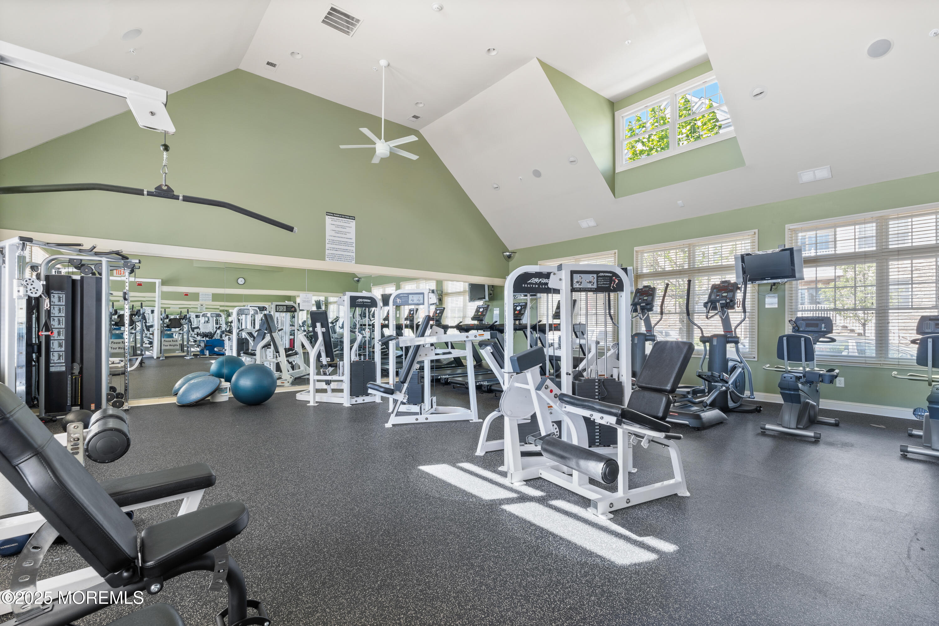 33 Cooper Avenue, Unit 208 Long Branch, NJ 07740 - Photo 29 of 43 a view of a room with gym equipment