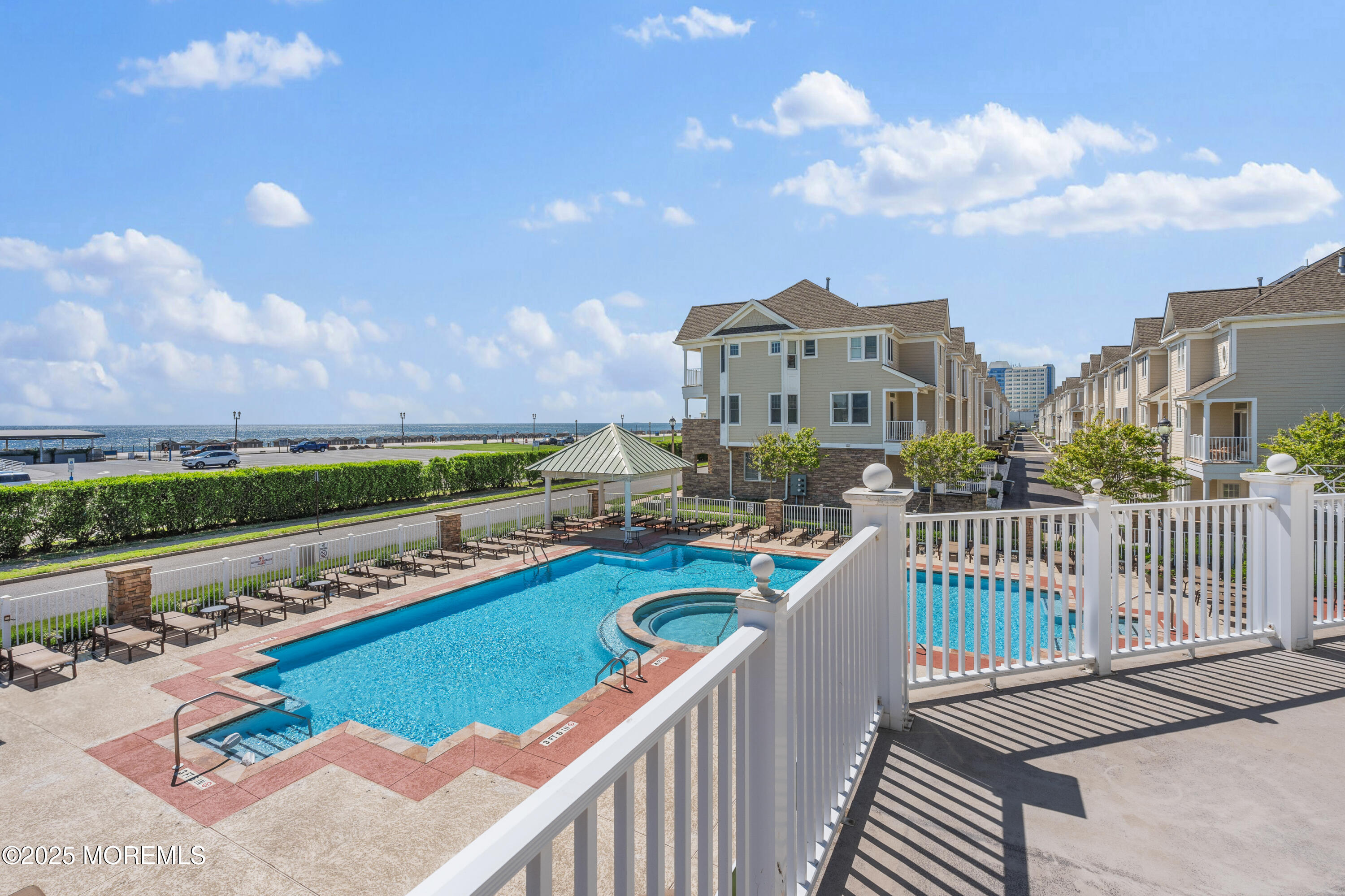 33 Cooper Avenue, Unit 208 Long Branch, NJ 07740 - Photo 36 of 43 a view of a city from a balcony