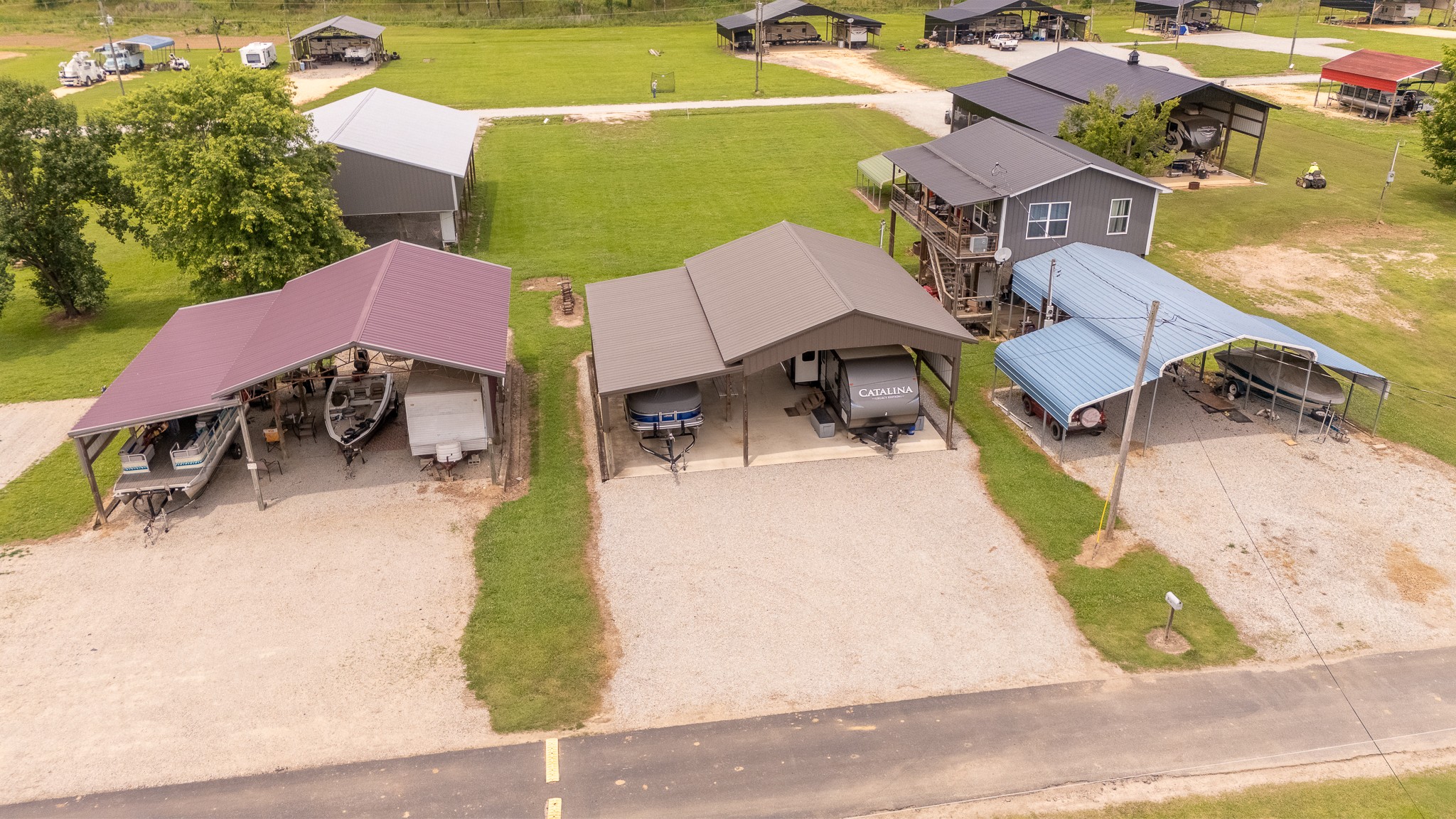 an aerial view of a house with swimming pool