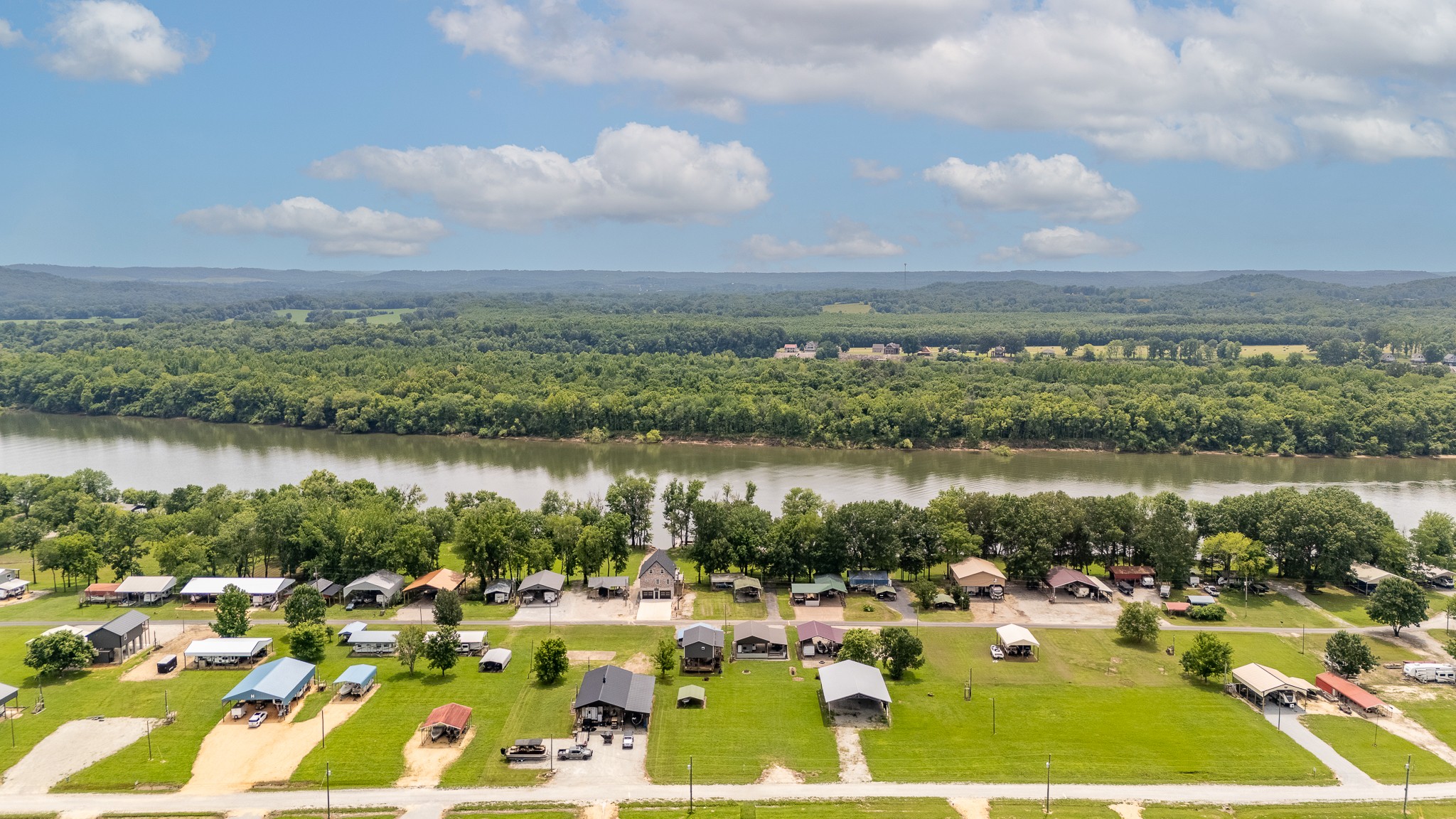 1038 WC PICKETT Road Clifton, TN 38425 - Photo 11 of 22 a view of a city with lake view